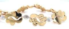 18kt 2 Tone gold high polished and diamond cut fancy link bracelet