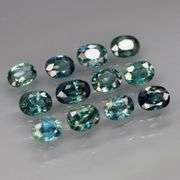 Heated only! 3.47ct bright blue green Sapphire set!