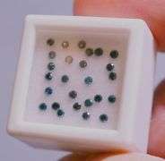 High fire! .63ct set of round brilliant cut Diamonds