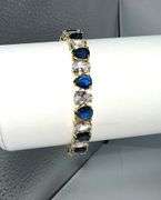 18 Kt. Yellow Gold Plated 32.5 Ctw. CZ and Simulated Blue Sapphire Tennis Bracelet