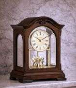 Bulova Clock Walnut Finish with Revolving Pendulum