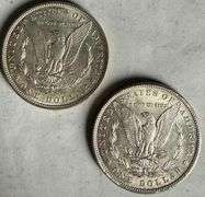 Two Raw 1896 Frosty White BU Morgans.