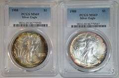 2 Original near perfect Gem BU 1988 $1 Silver Eagle coins. PCGS MS69