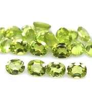 Dazzling 9.50ct untreated lime green Peridot set