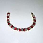 Stunning Yellow Gold Plated 32.5 Ctw Simulated Rudy Tennis Bracelet