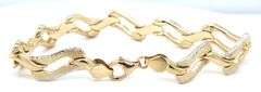 14kt Two tone gold diamond cut woven link bracelet