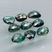 Awesome 4.60ct blue green rose cut Sapphire set!