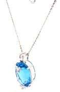14kt White gold 16ct blue topaz and diamond accent pendant on chain