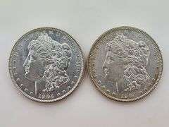 (2) 1904-O Morgan Silver Dollars