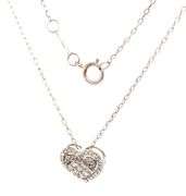 10kt White gold diamond cluster heart shaped pendant on chain