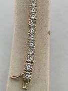 CERTIFIED BRAND NEW 14K YELLOW GOLD TENNIS BRACELET. 11.00 CARATS OF DIAMONDS.