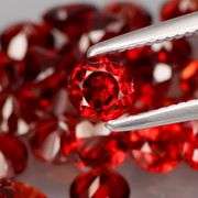 Outstanding 12.91ct top Mozambique red Garnet set!