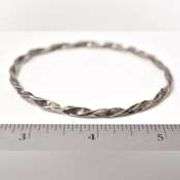 Twisted Bangle Bracelet in Sterling Silver.