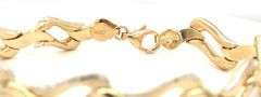 14kt Two tone gold diamond cut woven link bracelet
