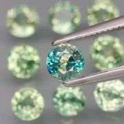 Exotic 2.70ct 9pc single vein blue green Sapphire set