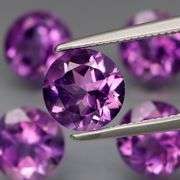 Glittering 6.03ct round cut Bolivian Amethyst set