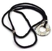 Tiffany & Co Atlas circle pendant on black cord necklace