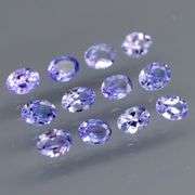 Glittering 1.84ct UNTREATED oval cut Tanzanite set