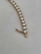 CERTIFIED BRAND NEW 14K YELLOW GOLD TENNIS BRACELET. 11.00 CARATS OF DIAMONDS.