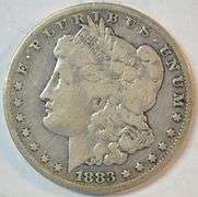 Scarce key date 1883-CC Morgan Silver Dollar in circ