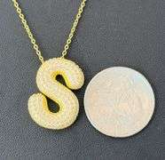 Sterling Silver 'S' Pendant with dancing Moissanite