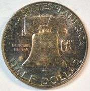 Superb Rainbow Toned Gem BU 1956 Franklin Half Dollar. FBL