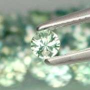 Exotic 4.01ct 35pc single vein bright blue green Sapphire set