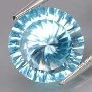 Don't get dizzy! It's an 8.26ct fan cut blue Topaz!!!