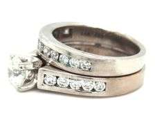 14kt White gold 0.78ct round brilliant cut in 0.65ctw diamond wedding set