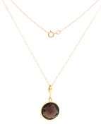 14kt Yellow gold bezel set smokey quartz pendant on chain