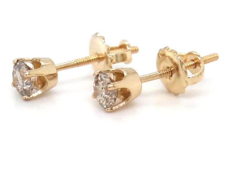 One pair of 14kt yellow gold top light brown round brilliant cut diamond stud earrings