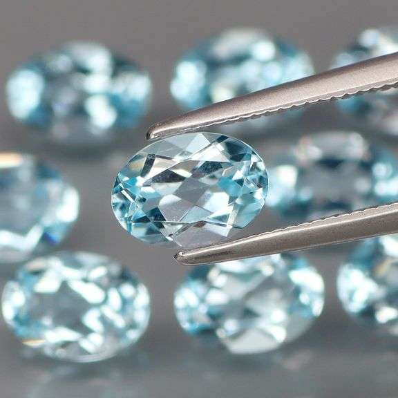 High fire and full of desire! Look at this vibrant 9.57ct Topaz set!