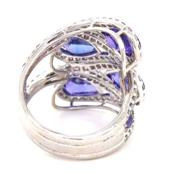 18kt White gold 10ctw Tanzanite and 2.85ctw diamond halo ring