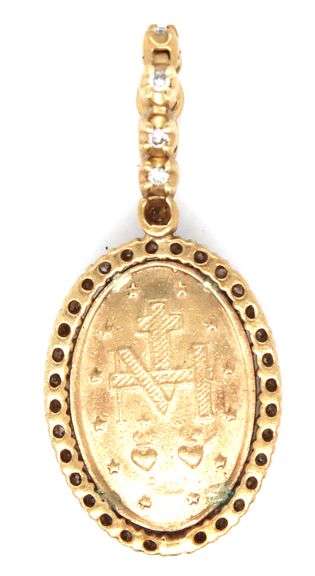 Nice 10K YG Miraculous Medal surrounded by Diamonds