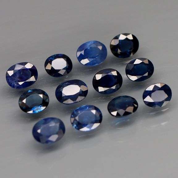 Richly colored! Heavy! 4.77ct navy blue Sapphire set -Heated only!