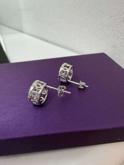 Beautiful Daily wear Circle earrings with center dancing moissanite in sterling silver