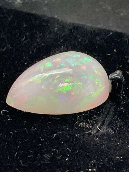 NATURAL OPAL - 10.02 CARATS PEAR CABOCHON CUT