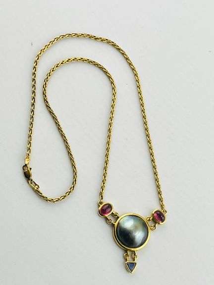 18KT Yellow Gold Center Round Gray Pearl Flanked By Two Oval Pink Tourmaline And Blue Topaz Dangling