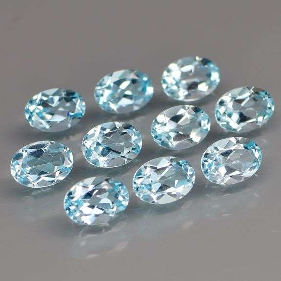 High fire and full of desire! Look at this vibrant 9.57ct Topaz set!