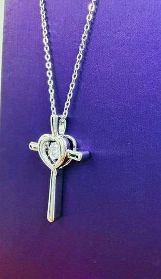 Beautiful cross with heart center Moissanite pendant in sterling silver