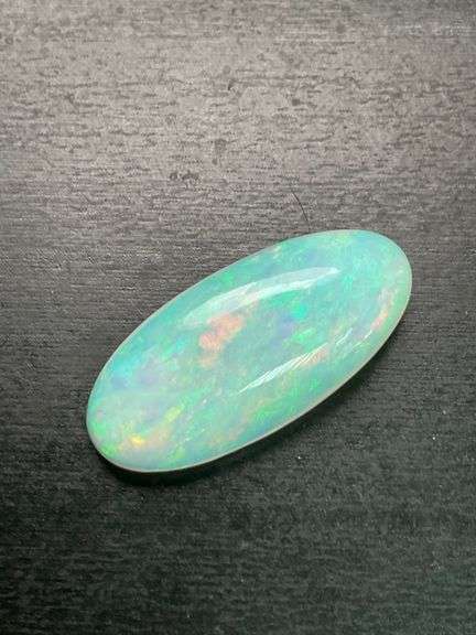 NATURAL OPAL- LOOSE- 17.54 CARAT. OVAL CABOCHON CUT