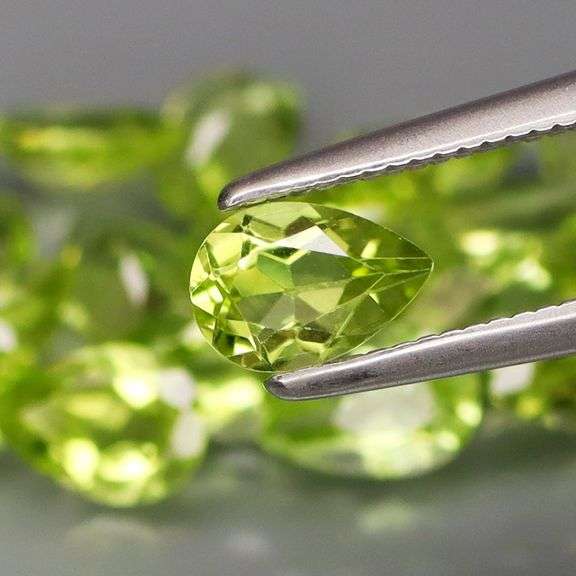 Dazzling 8.32ct untreated apple green Peridot set