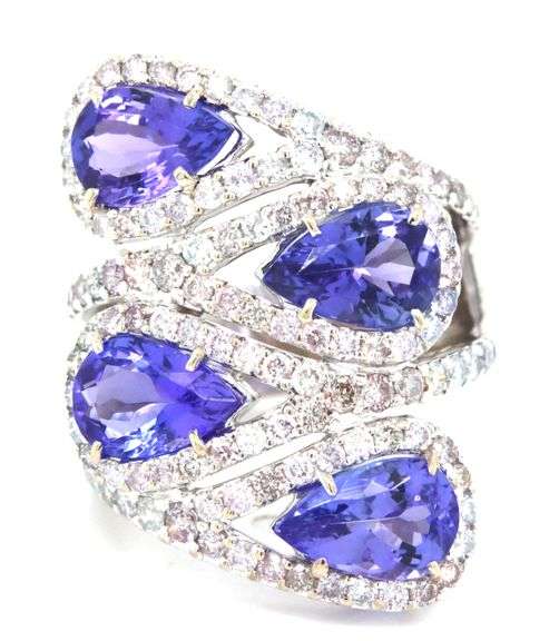 18kt White gold 10ctw Tanzanite and 2.85ctw diamond halo ring