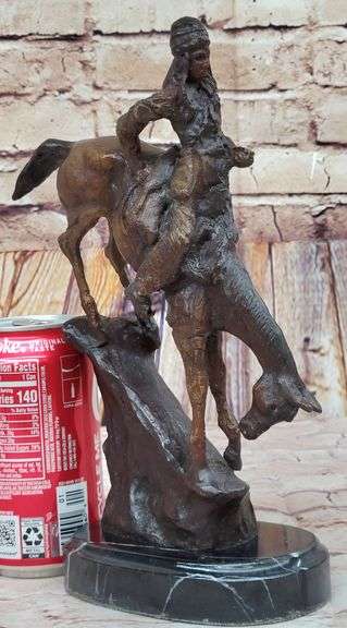 Chief Riding Horse on a Rock Bronze Sculpture