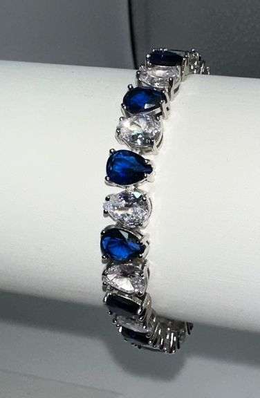 Stunning White Gold Plated 32.5 Ctw Simulated Sapphire and CZ Tennis Bracelet