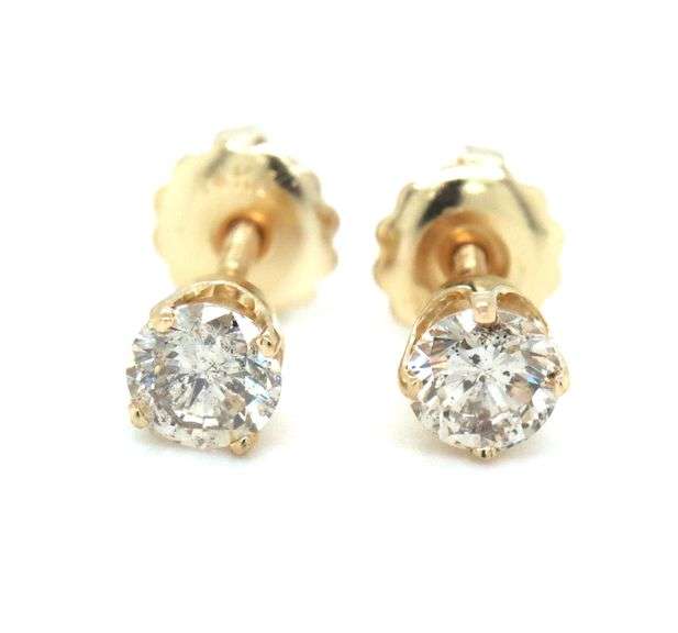 One pair of 14kt yellow gold top light brown round brilliant cut diamond stud earrings