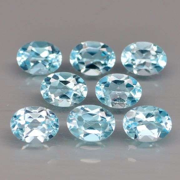 Glittering set of 8 full fire sky blue Topaz! 12.36 carats!