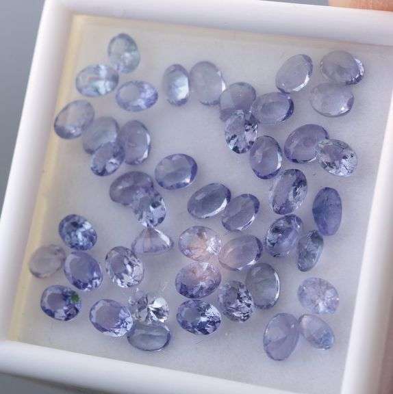 Heavy flashing! Untreated! 7.11ct oval cut Tanzanite set