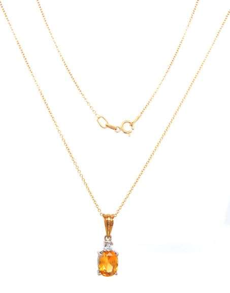 18kt Yellow gold 1.65ct oval yellow sapphire and diamond accent pendant on chain