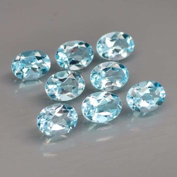 Glittering set of 8 full fire sky blue Topaz! 12.36 carats!